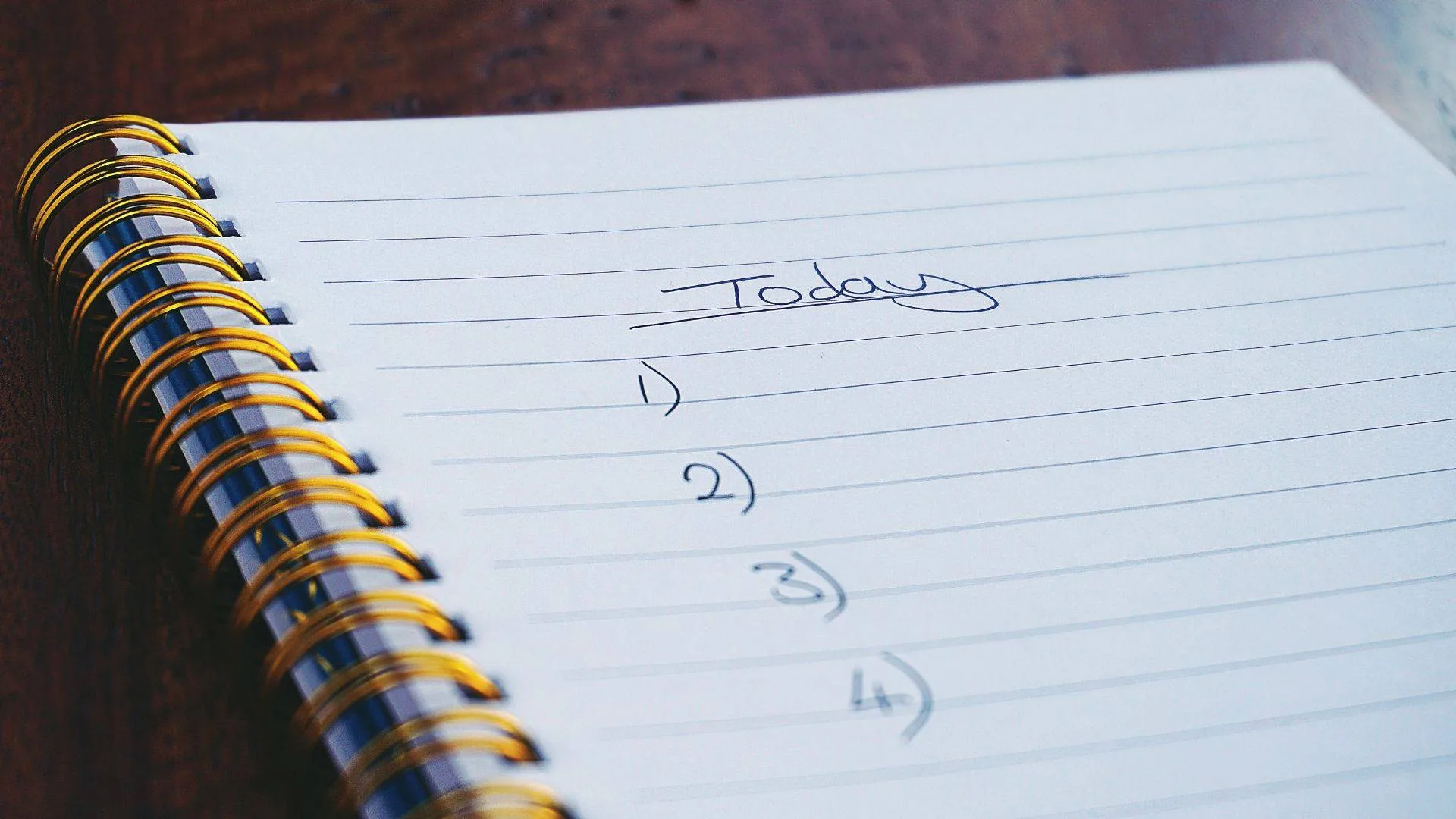 notepad with 4 steps representing starting a small farm or homestead business